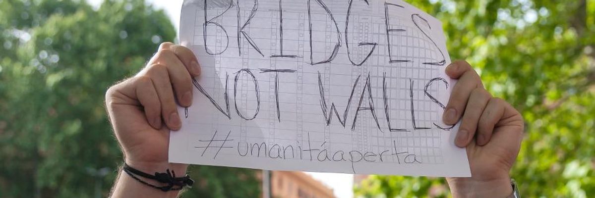 'New Walled Order' for Migrants Worldwide as Governments Criminalize Compassion and Erect Barriers to Basic Services