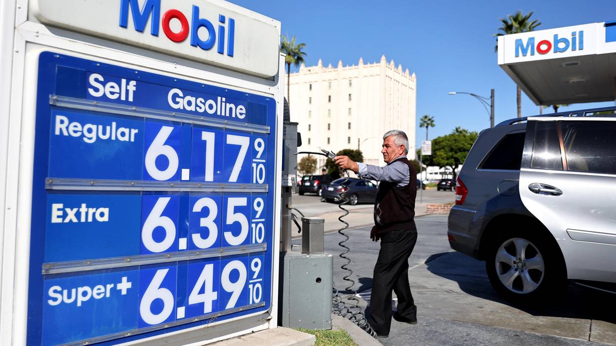 A sign at a Mobil station shows high gas prices on October 28, 2022 in Los Angeles, California.