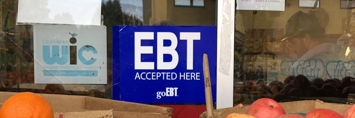 A sign confirms that a grocery store in Oakland, California accepts electronic benefit transfer (EBT) cards used by welfare departments to issue benefits on December 4, 2019.
