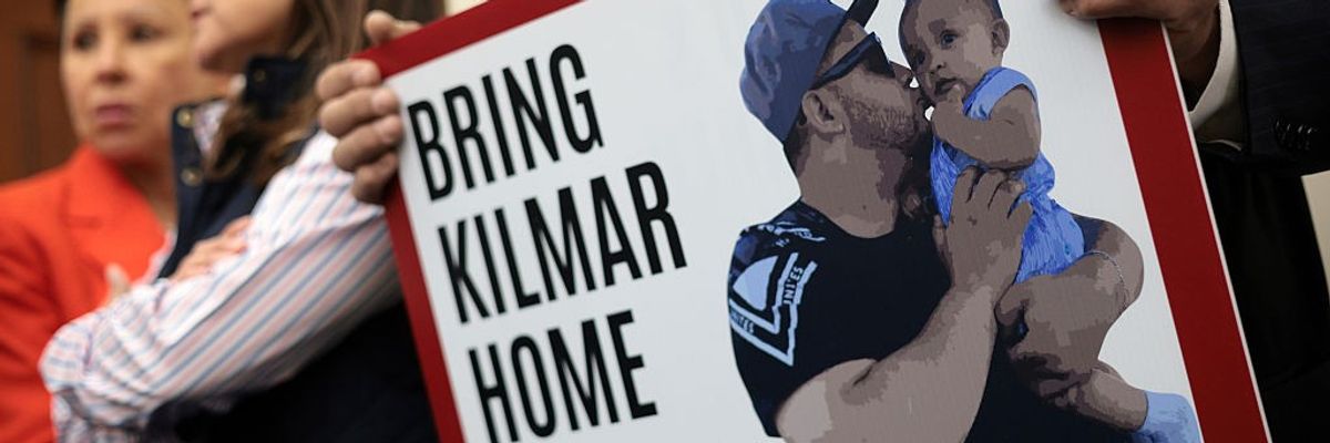 a sign demanding the return of Kilmar Abrego Garcia