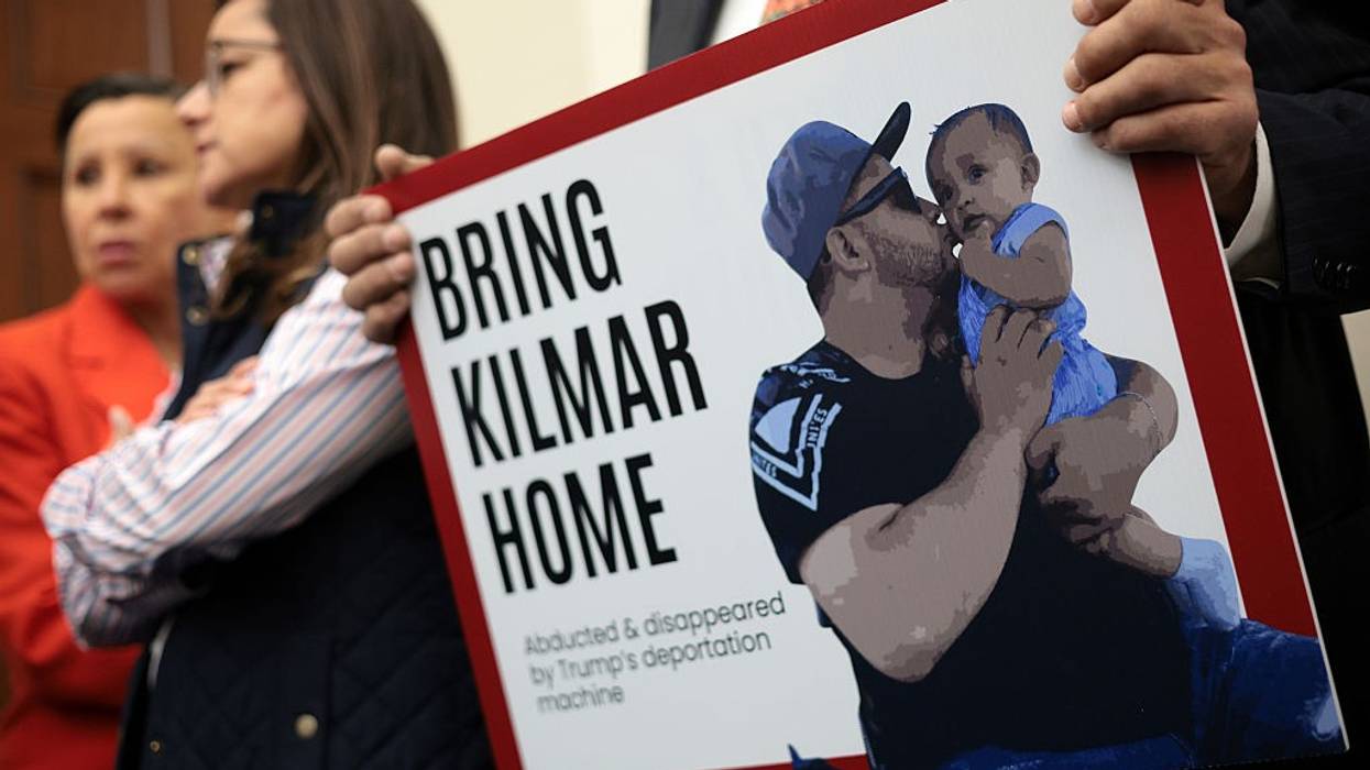 a sign demanding the return of Kilmar Abrego Garcia