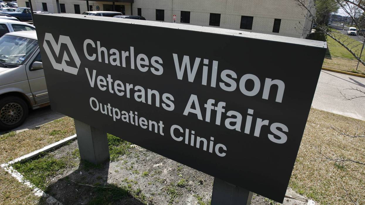 A sign for a VA clinic
