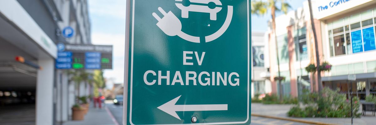 A sign for an electric vehicle charging station is seen in San Jose, California on January 3, 2020.