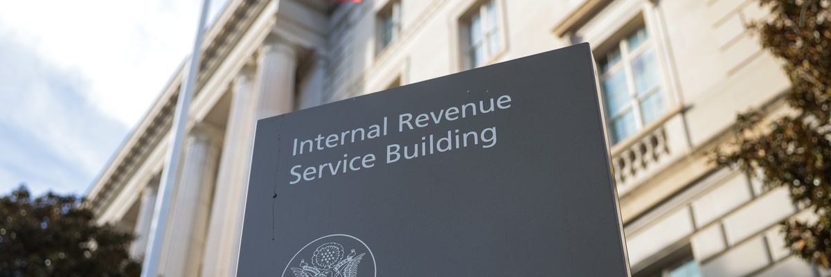 A sign for the Internal Revenue Service is seen outside its building on February 13, 2025