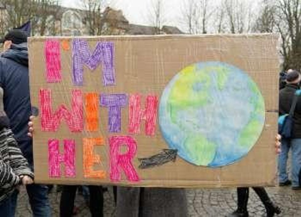 A sign held outside the Bonn climate summit. (Photo: Lisa Mannhardt/flickr/cc)