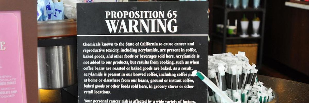 A sign in a San Francisco Starbucks coffee shop warns customers that coffee and baked goods sold at the shop and elsewhere contain acrylamide, a chemical known to cause cancer and reproductive toxicity.