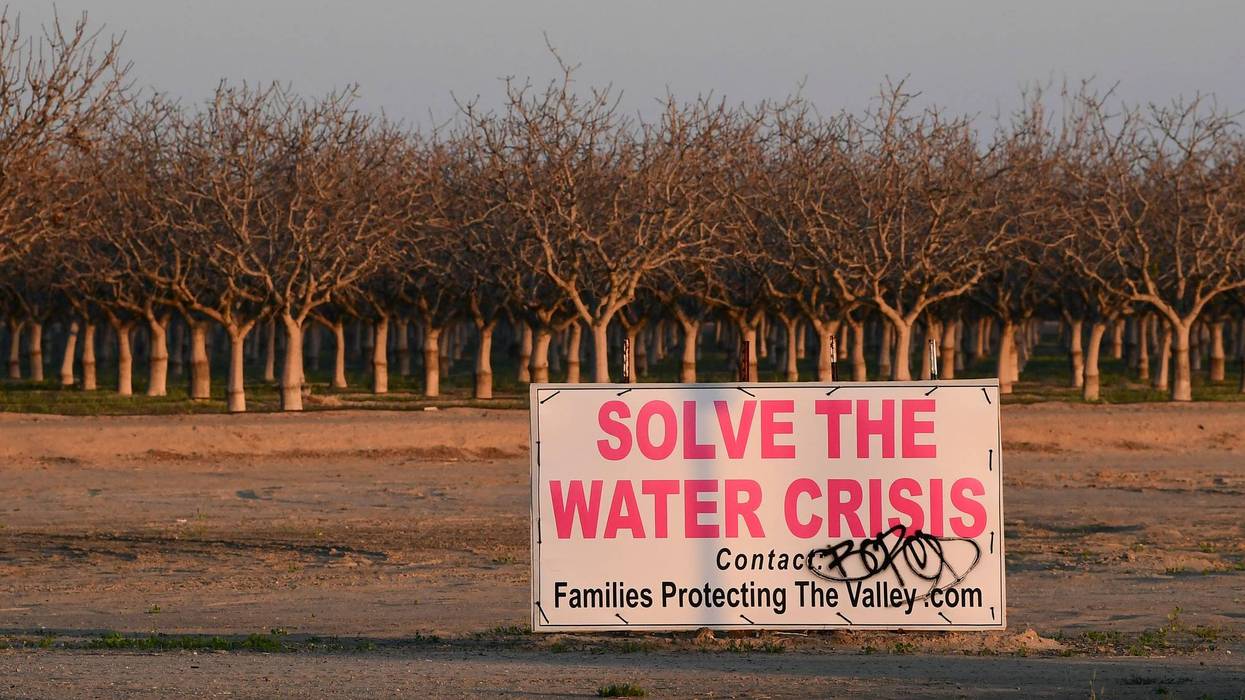 A sign in the San Joaquin Valley reads, "Solve the Water Crisis."