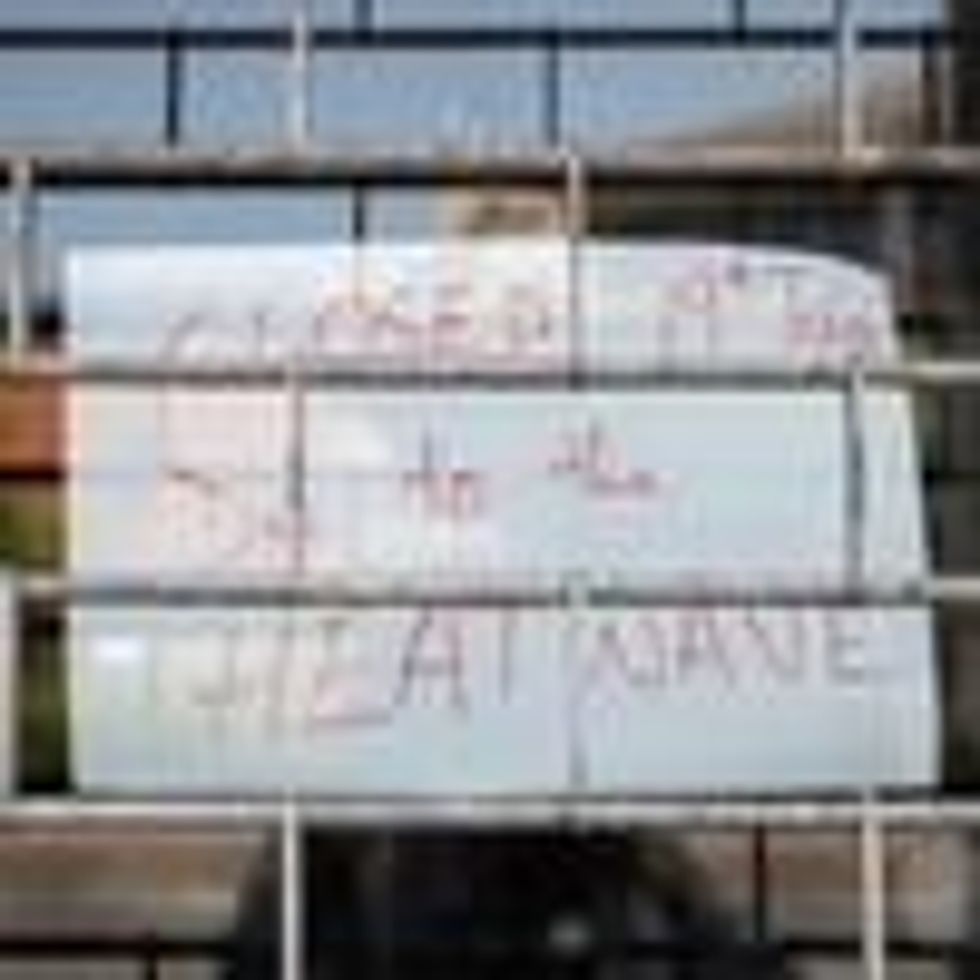 A sign indicating that a store is closed due to an ongoing heatwave is seen in London on July 19, 2022.