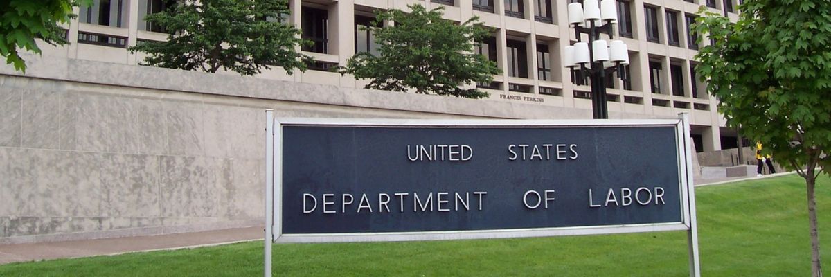 A sign outside the U.S. Department of Labor headquarters