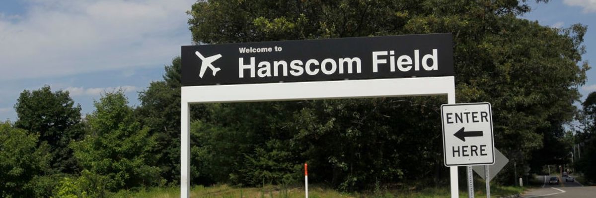 A sign points to Hanscom Field.