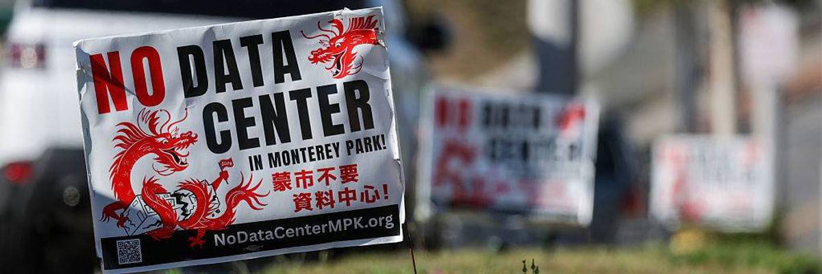 A sign reads "No data center in Monterey Park.