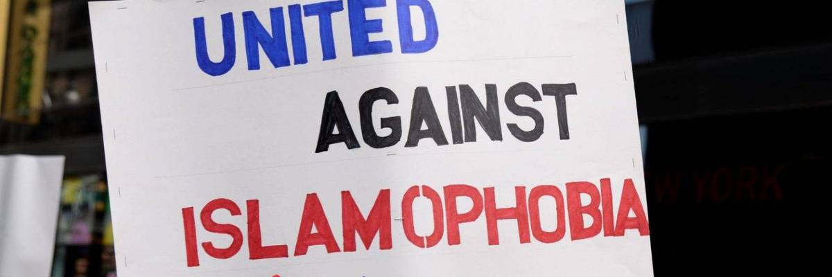 A sign reads, "United Against Islamophobia."