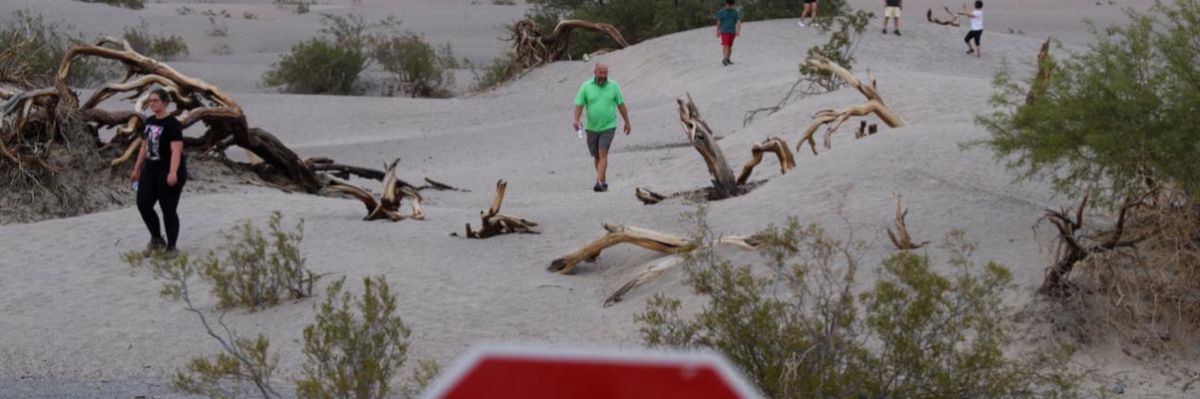 A sign saying "Stop, extreme heat danger" in Death Valley National Park