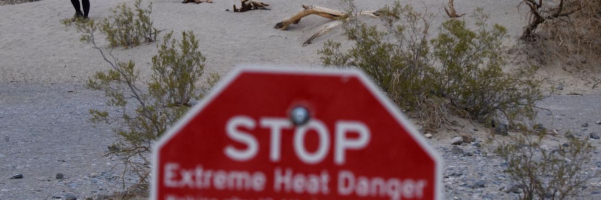 A sign saying "Stop, extreme heat danger" in Death Valley National Park