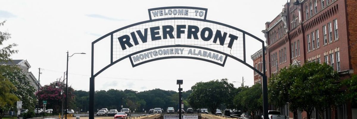 A sign saying, "Welcome to Riverfront, Montgomery, Alabama."