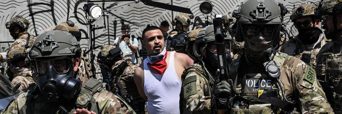 A single demonstrator is arrested by ICE and other agents in LA.