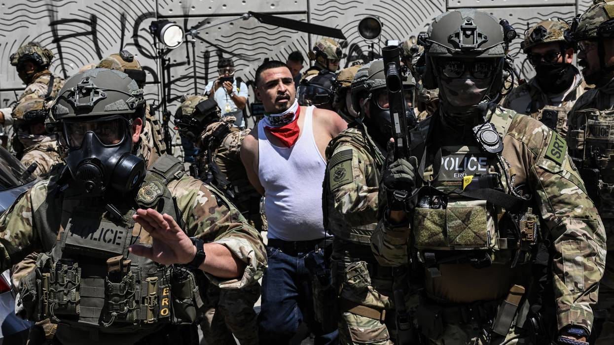 A single demonstrator is arrested by ICE and other agents in LA.