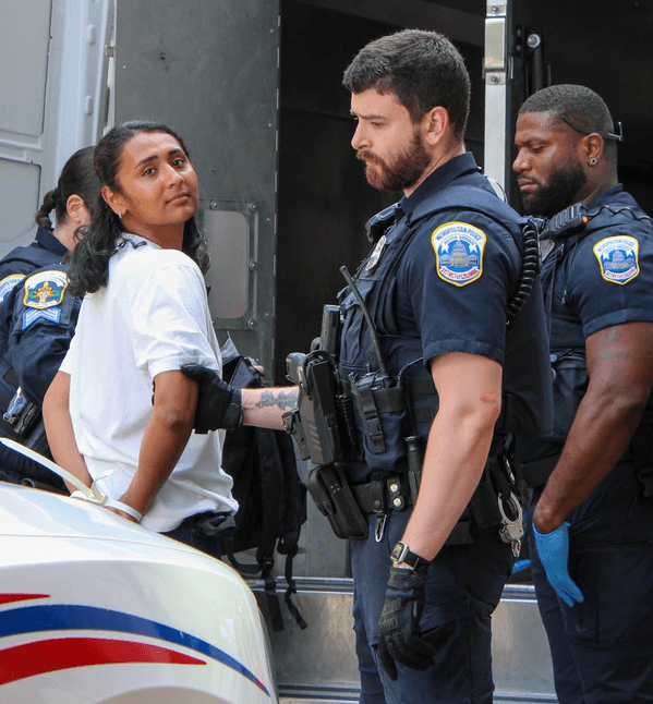 A student protester is arrested in Washington, DC on August 10, 2026.