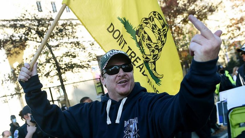 A supporter of President Donald Trump insults counter-protesters during a rally in Washington, D.C., on November 14, 2020