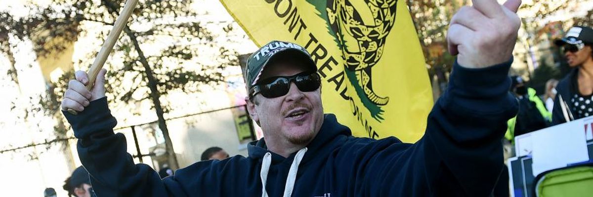 A supporter of President Donald Trump insults counter-protesters during a rally in Washington, D.C., on November 14, 2020