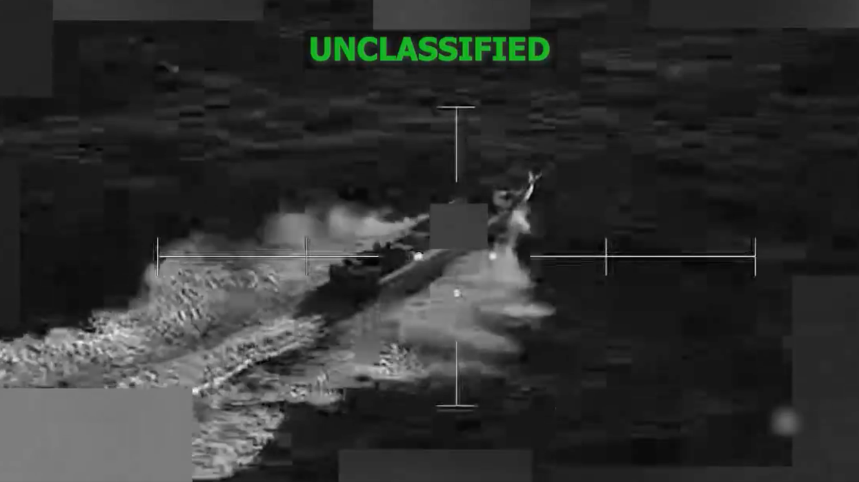 A surveillance image shows a boat in the Pacific Ocean