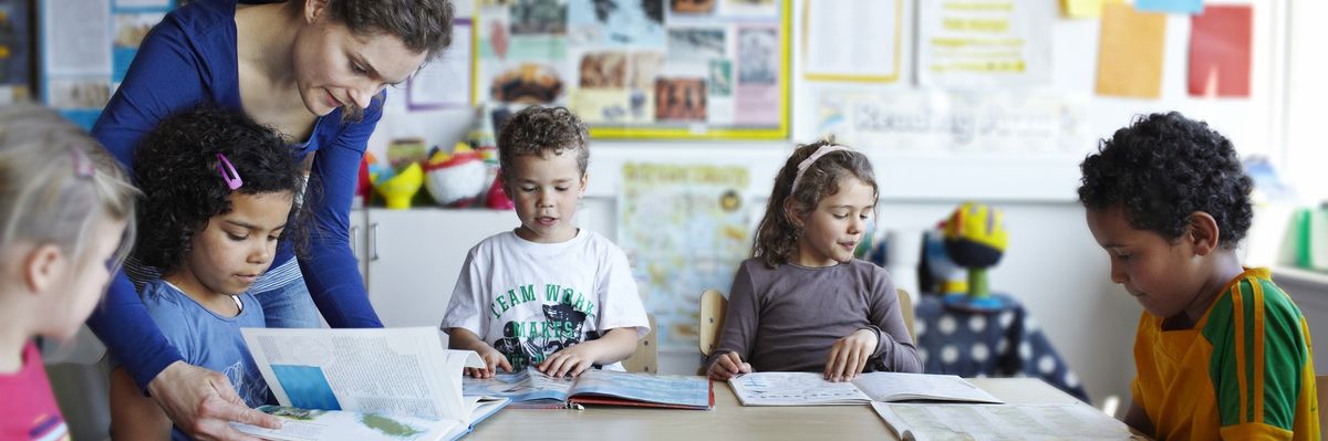 A teacher reads with students
