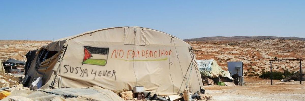 A tent stands in the community of Khirbet Susiya