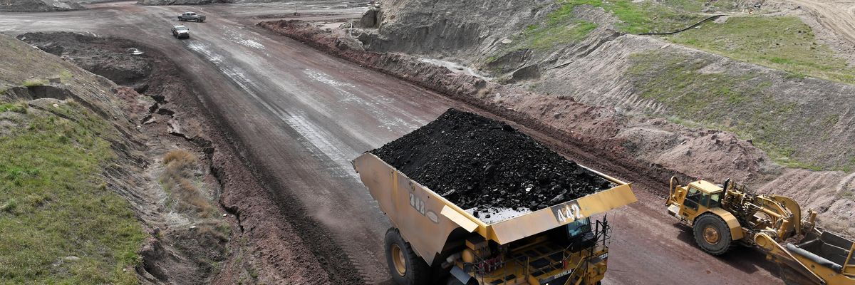 A truck loaded with coal is viewed at the Eagle Butte Coal Mine