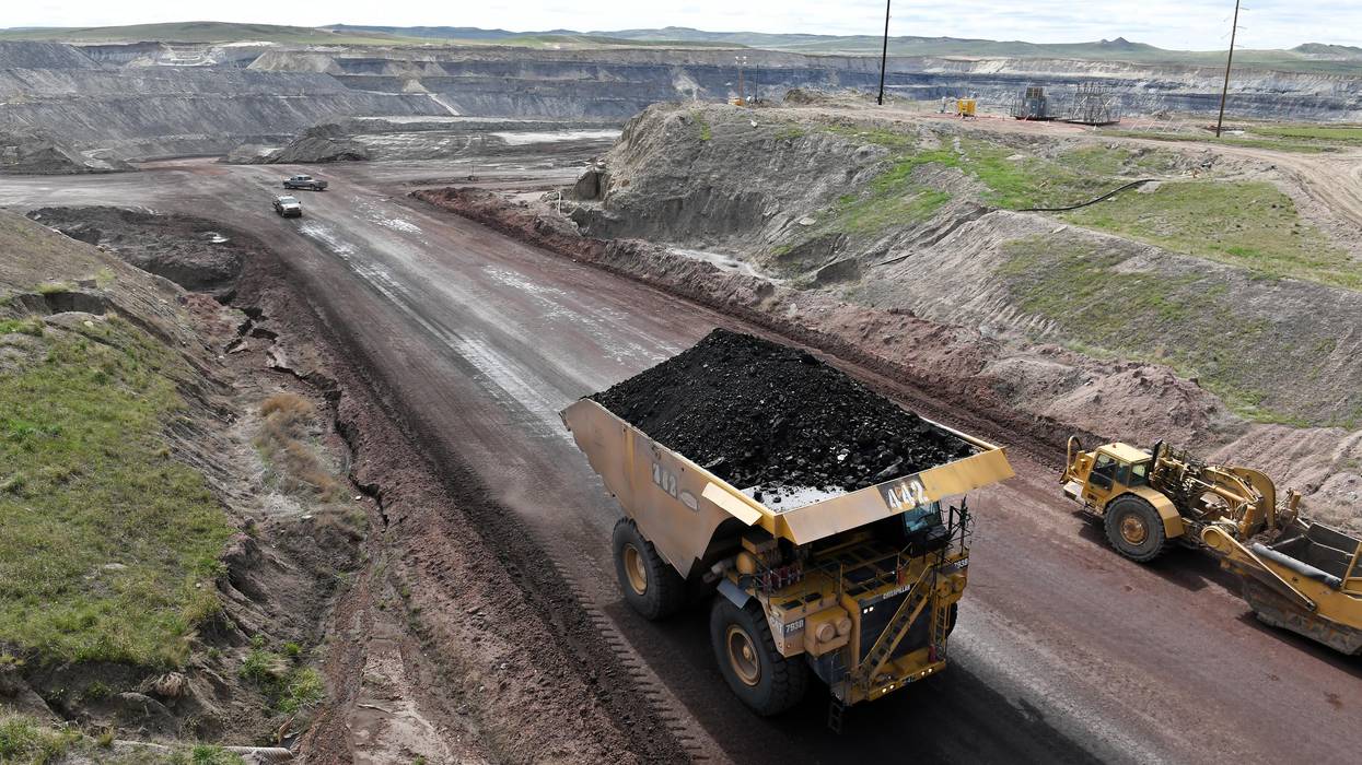 A truck loaded with coal is viewed at the Eagle Butte Coal Mine