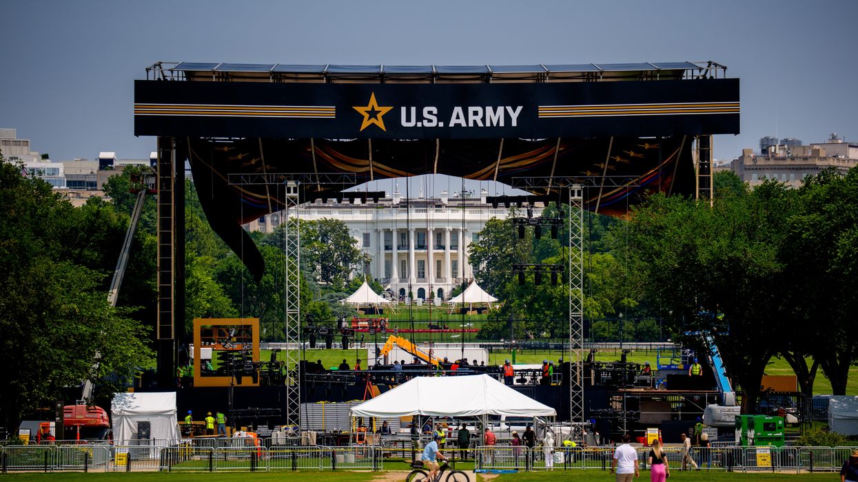 A U.S. Army stand is built in front of the White House.