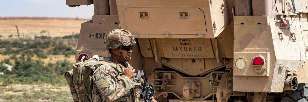 A U.S. soldier stands on the Turkey-Syria border