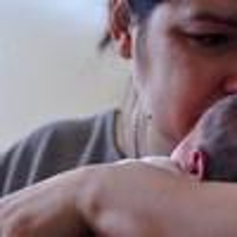 A Ukrainian mother holds her child