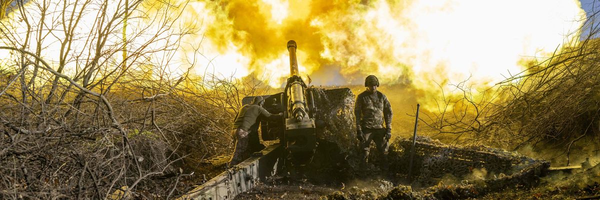 A Ukrainian soldier of an artillery unit fires towards Russian positions outside Bakhmut in November of 2022