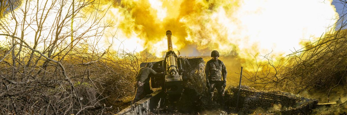 A Ukrainian soldier of an artillery unit fires towards Russian positions outside Bakhmut in November of 2022