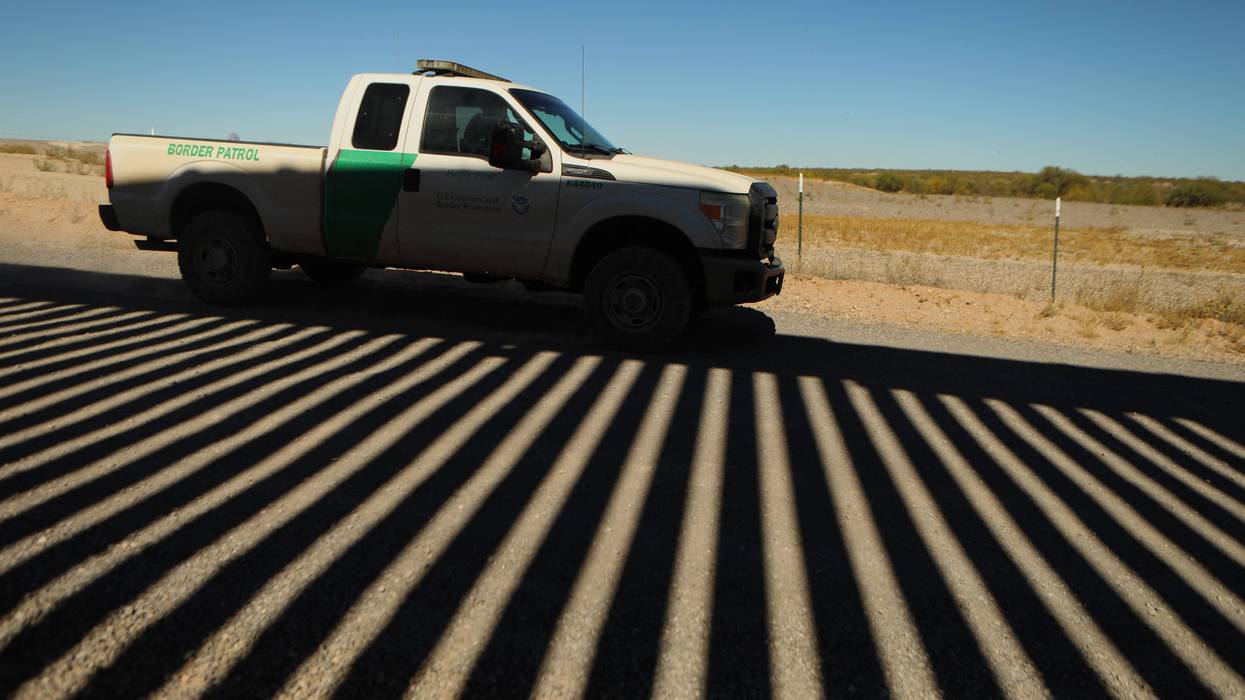 A US Border Patrol unit tours the border wall in Arizona