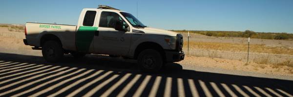 A US Border Patrol unit tours the border wall in Arizona