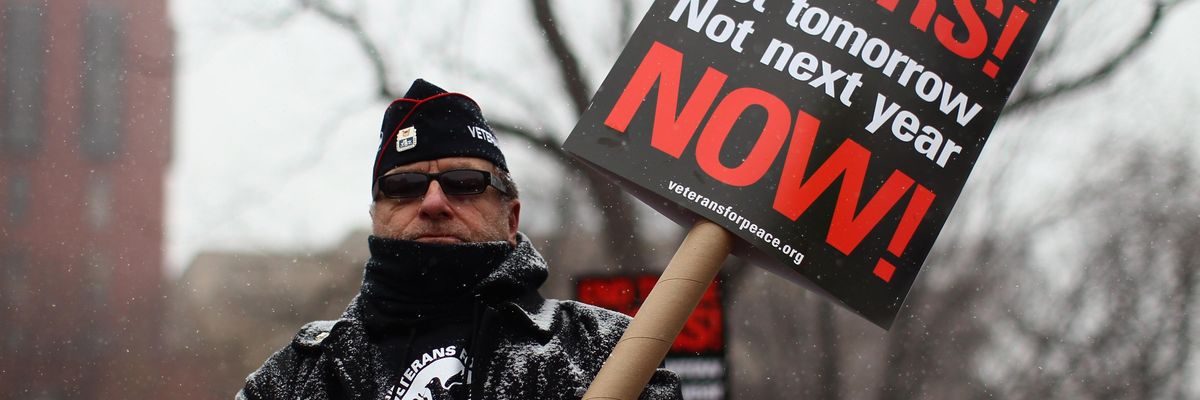 A veteran protests wars