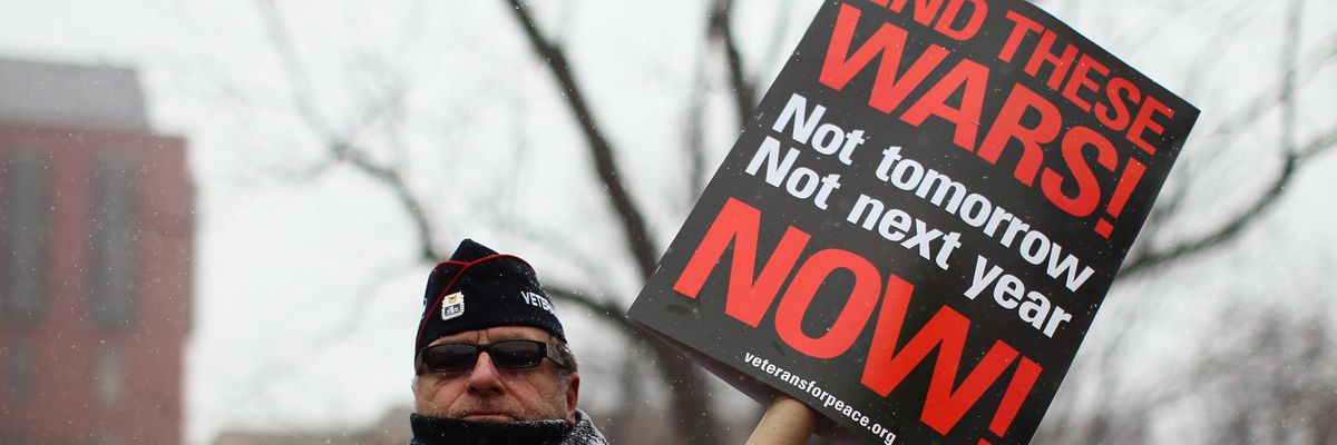 A veteran protests wars