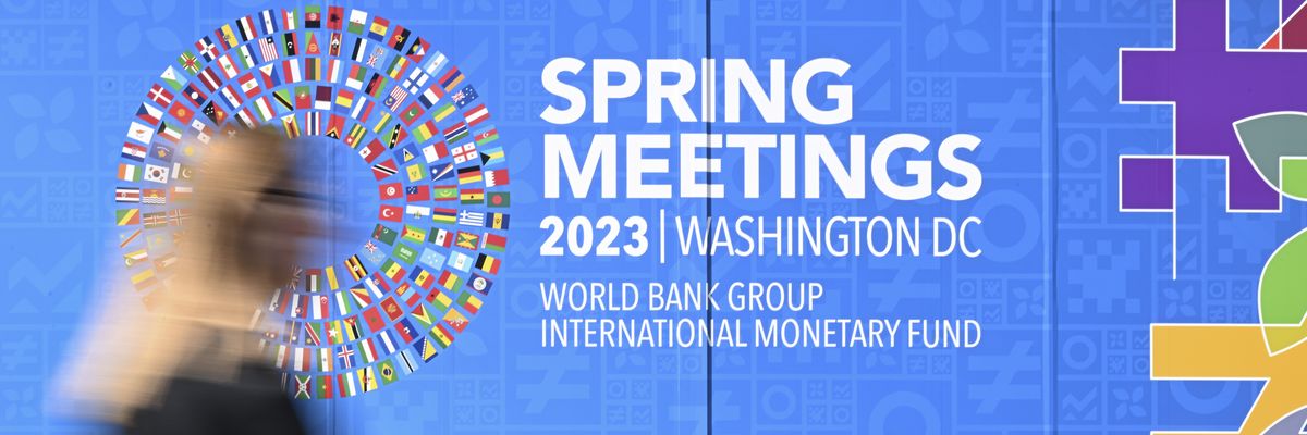 A view of the sign for the 2023 Spring Meetings of the World Bank and International Monetary Fund
