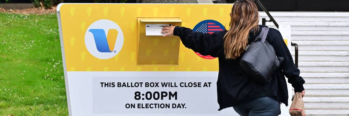 A voter drops off a ballot in the 2026 California primary.