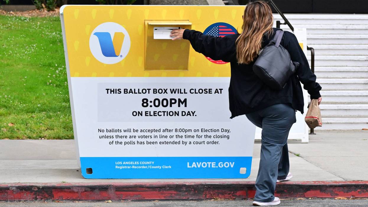 A voter drops off a ballot in the 2026 California primary.