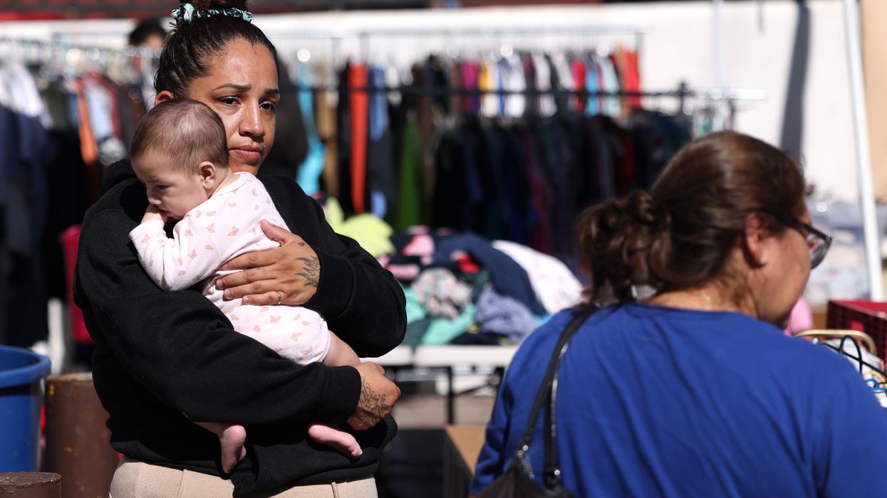 A woman and child at a neighborhood center.