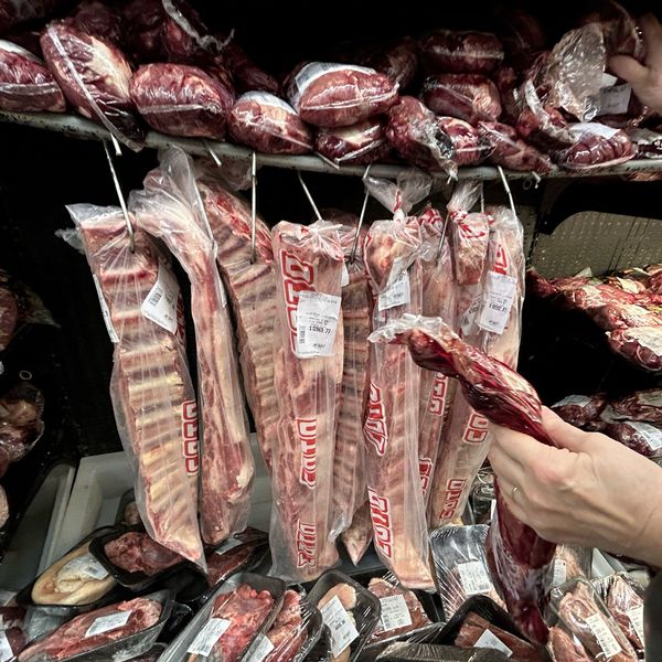 A woman buys beef at a supermarket in Buenos Aires, Argentina on May 2, 2024.