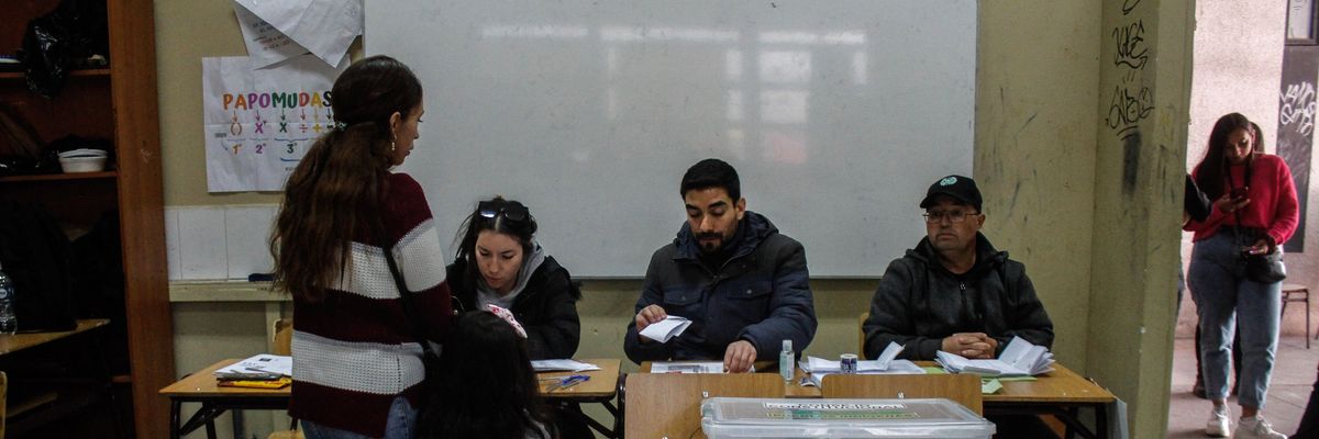 A woman casts her ballot at a polling station in Valparaíso, Chile on May 7, 2023.