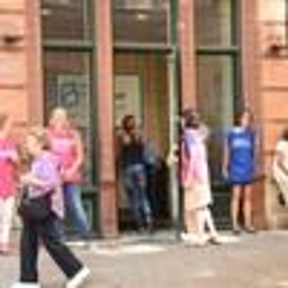 A woman enters Planned Parenthood