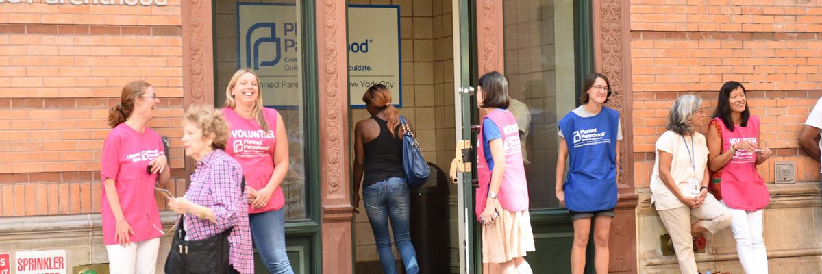 A woman enters Planned Parenthood