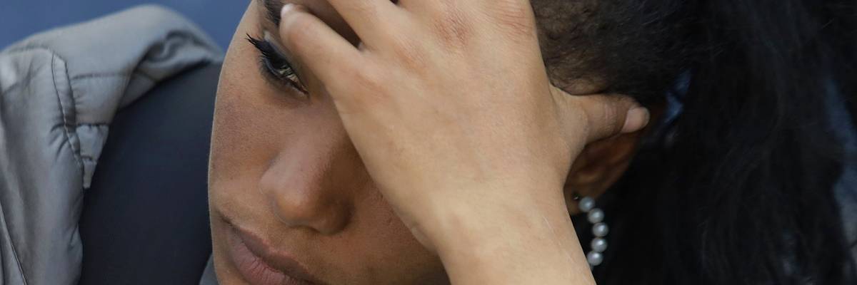 A woman is seen outside the Mexican Commission for Refugee Assistance in Mexico