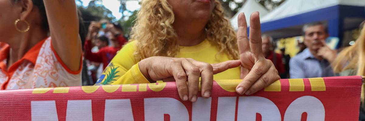 A woman protests in favor of Maduro.