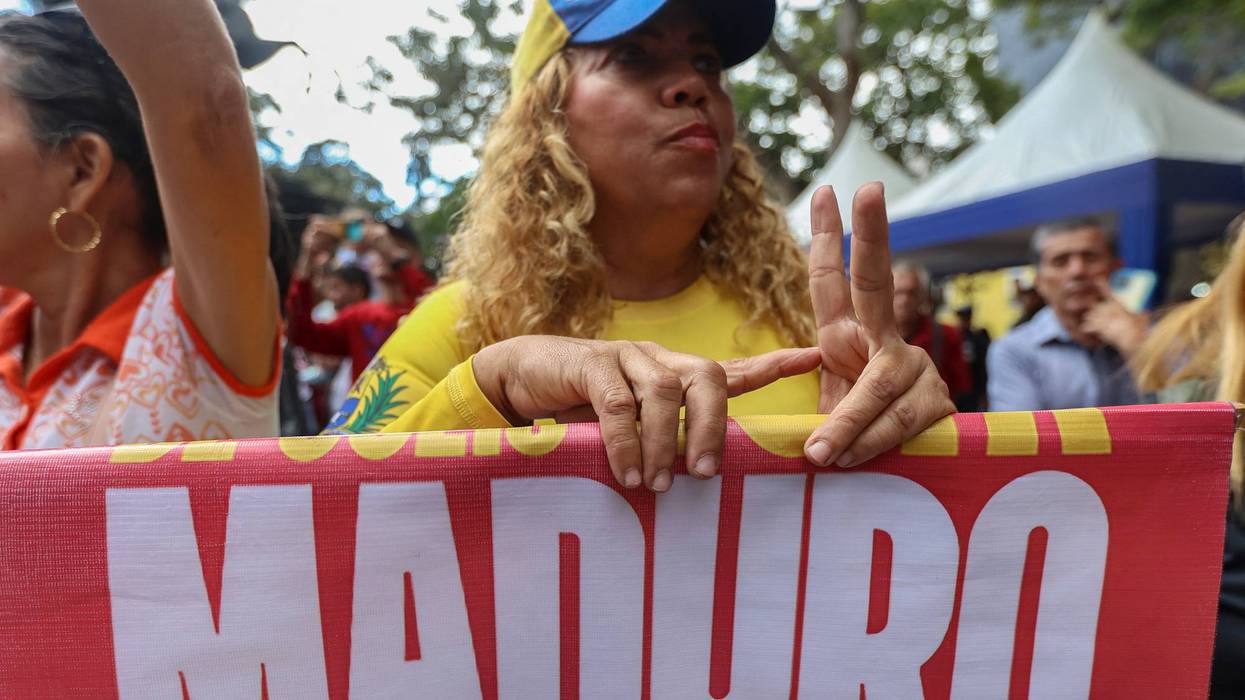 A woman protests in favor of Maduro.