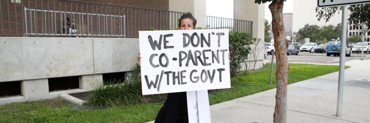 A woman protests mask mandates in Florida.